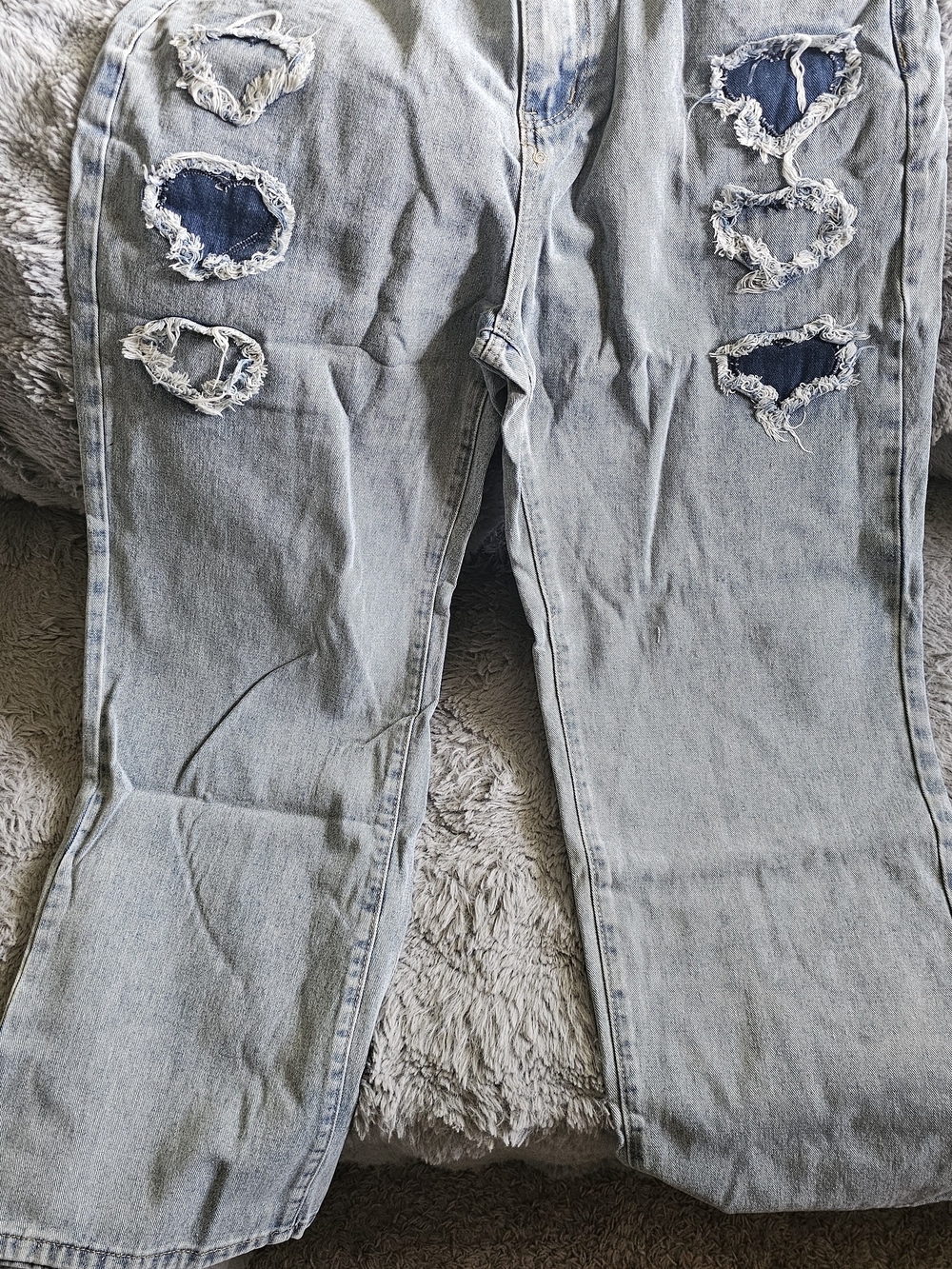 Light Blue Distressed Wide-Leg Women's Jeans with Dark Patch Accents